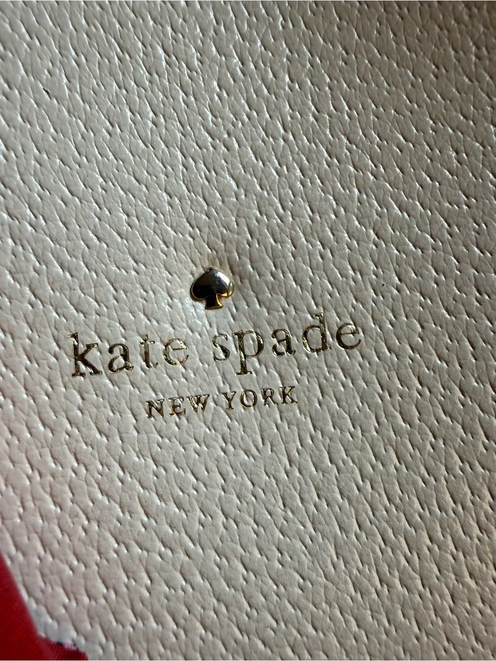 Kate Spade cream satchel with red and multicolor scarf tie. Very Good Condition